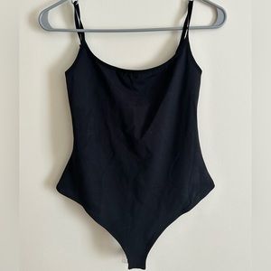 Intimately Free People black open back criss cross bodysuit in size small
